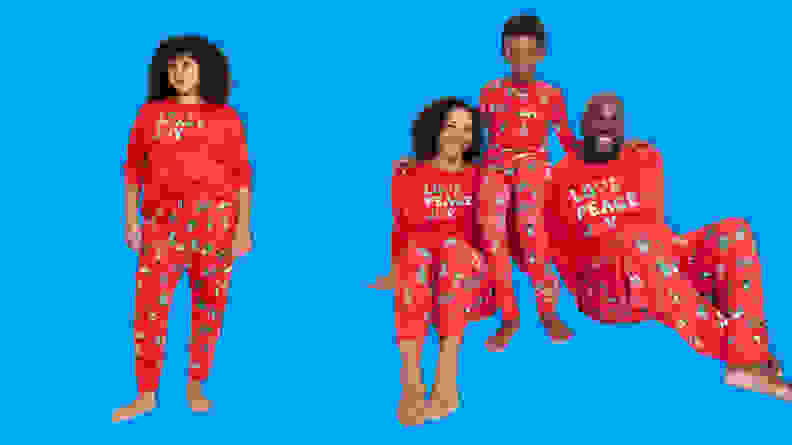 A family wearing the Wondershop Holiday City Matching Family Pajama Set.