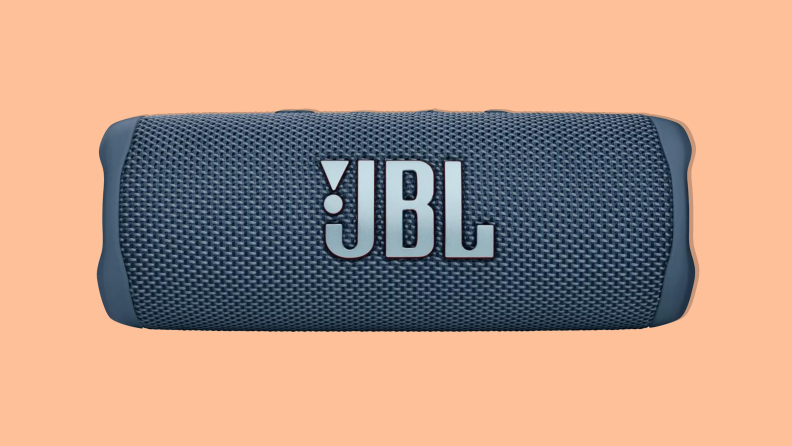 Gifts for girlfriend JBL Flip 6 portable bluetooth speaker on an orange background.