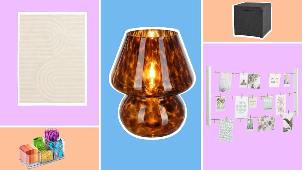 Dorm room decor items like white area rug, desk organizer, small tortoise colored mushroom lamp, cube-shaped ottoman, and clothesline picture collage.