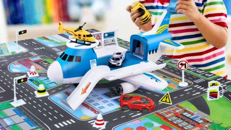 A full set of cars, accessories, and a fun toy plane.
