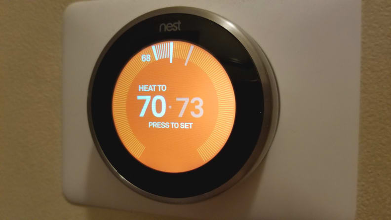 Nest thermostat with orange background