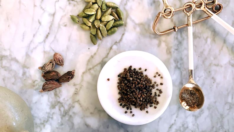 You can find cardamom in many different forms (from left): black cardamom pods, green cardamom, cardamom seeds, and ground cardamom.