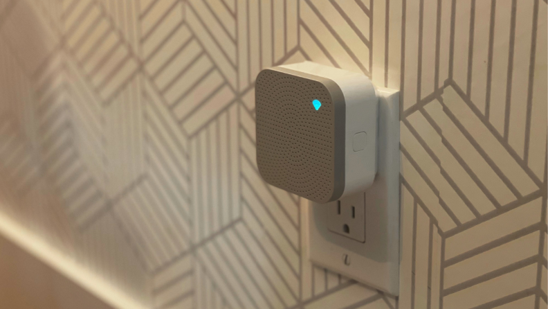 The Wyze Chime for video doorbells plugged into an electrical outlet