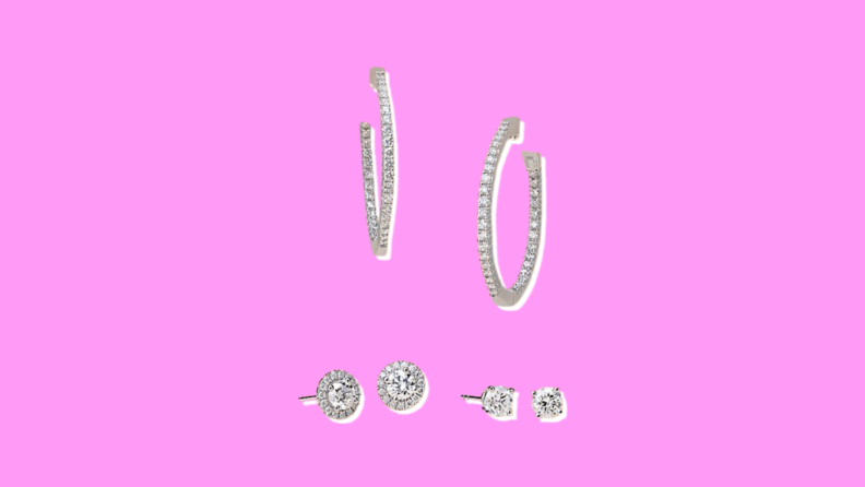 Blue Nile Diamond Earrings on a pink background.