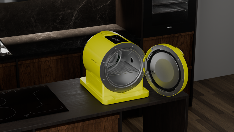 A sleek, modern yellow countertop appliance with a futuristic barrel-shaped design and an open door, revealing a stainless steel interior, set in a dark, stylish kitchen.