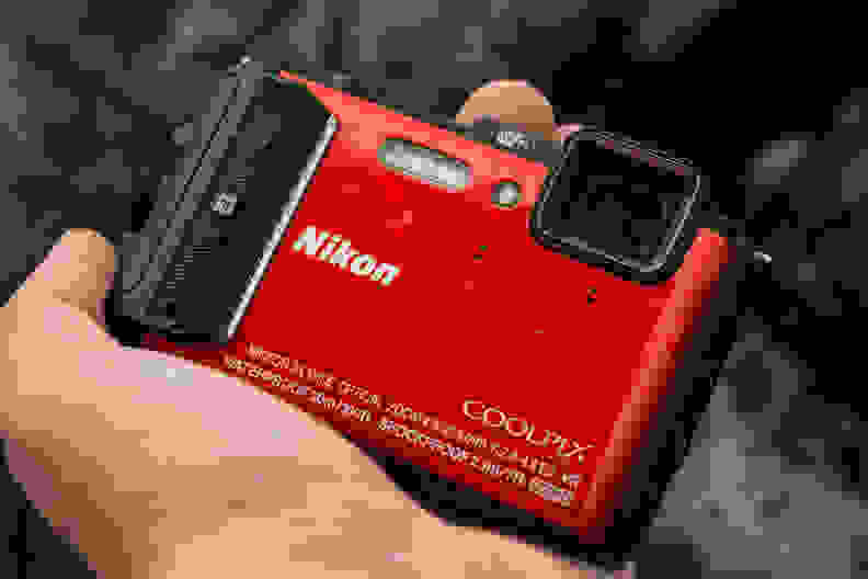 A photo of the Nikon Coolpix AW130 in a hand.