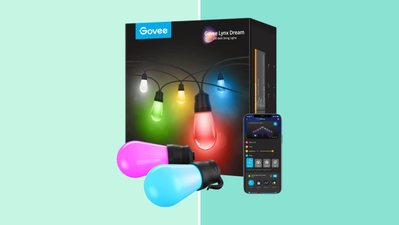Govee smart String lights displaying pink and blue next to a cell phone