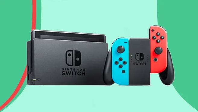 Nintendo Switch gaming console with blue and red controllers.