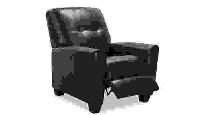A cozy but firm black recliner sits with the leg rest halfway extended.