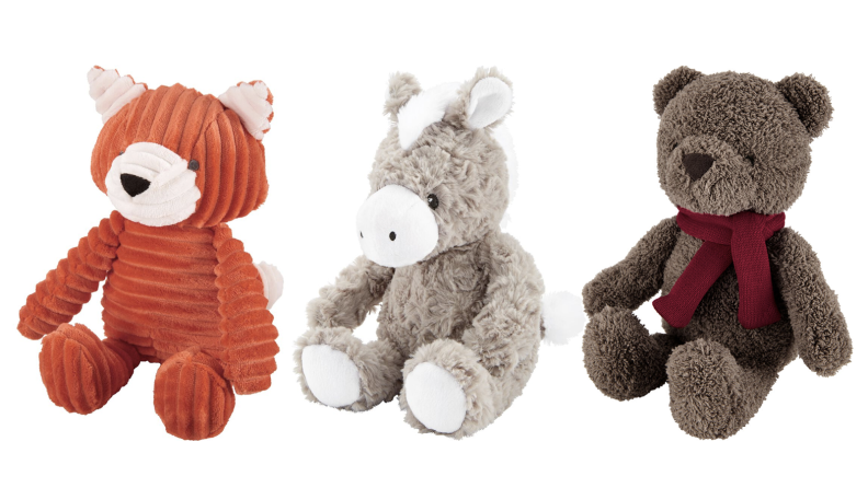 A stuffed fox, donkey, and teddy bear.