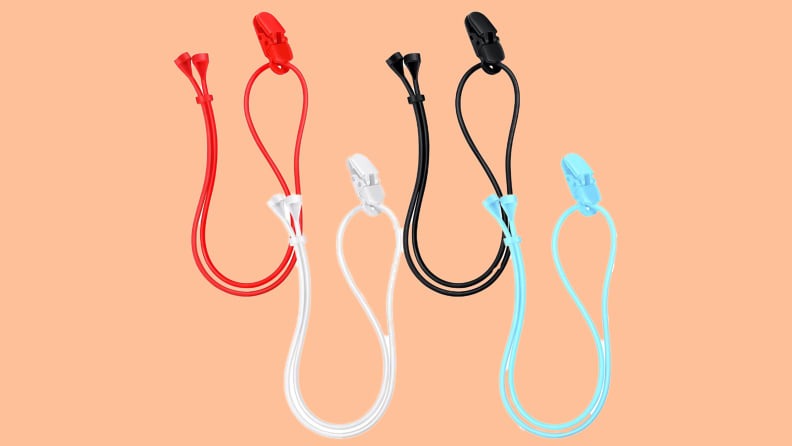 Red, white, black and blue hearing aid clips with straps.