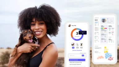 A woman holding a small brown dog outdoors next to two smartphone screens displaying detailed pet DNA test results.