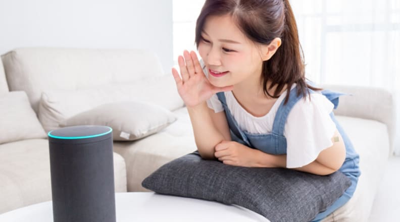 Girl talking to Echo