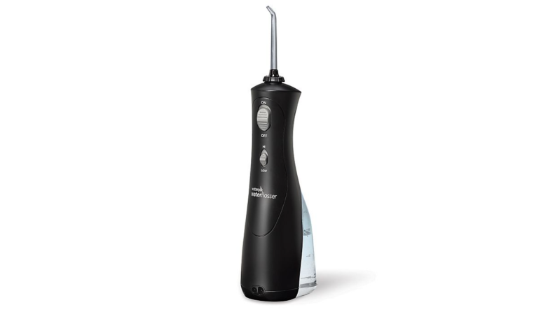 A Waterpik teeth flosser against a white backdrop.