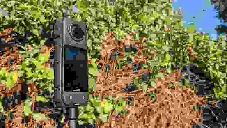 A lower view of screen and camera on the Insta360 X4 Action Camera outdoors.