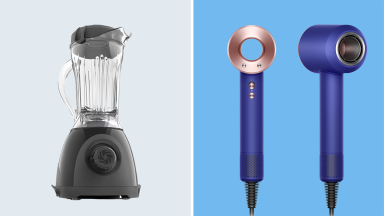 blender and dyson hair dryer on background