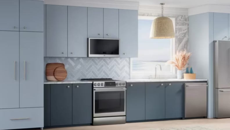 A range sits in cabinetry in a kitchen setting