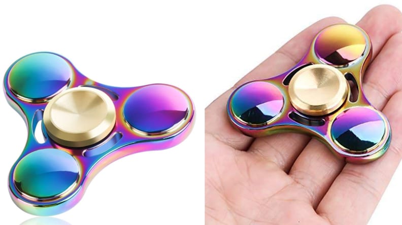 Fidget spinner in hand.