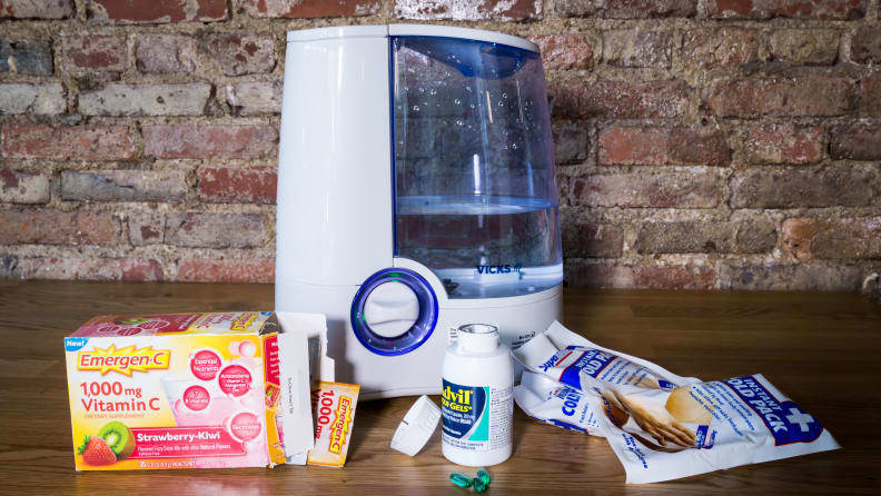 A Vicks humidifer is placed among a box of Emergen-C, Advil and more