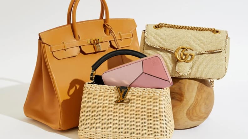 Three tan designer bags.