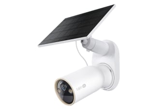 Three large sized security cameras on a gray background