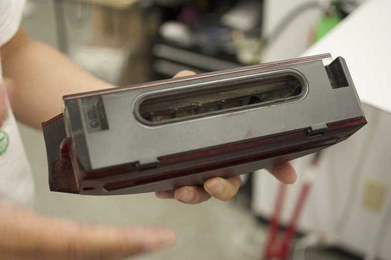 The canister for a robot vacuum.