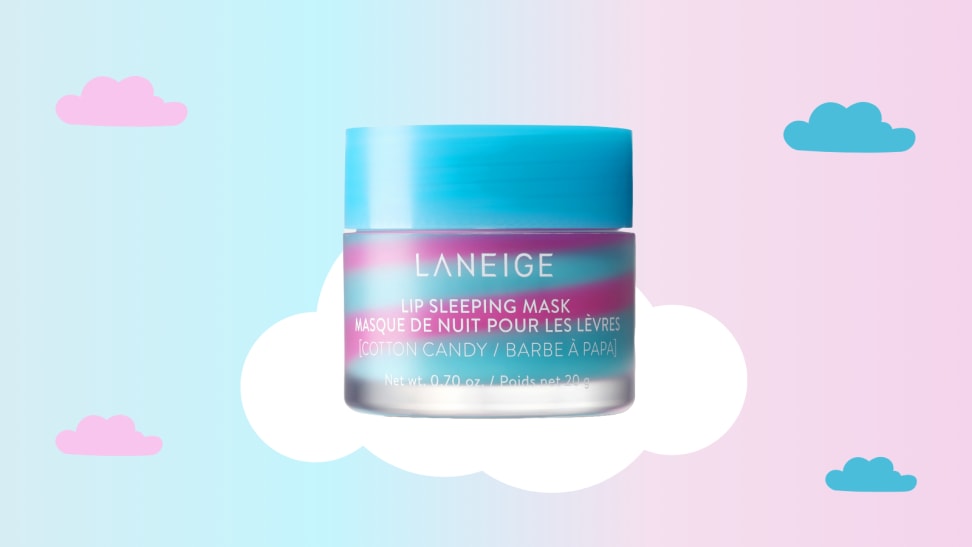 Laneige Cotton Candy Lip Sleeping Mask sitting on a cloud against a blue and pink background.