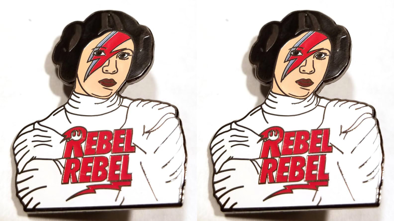 Pin with Princess Leia with David Bowie lightning makeup.