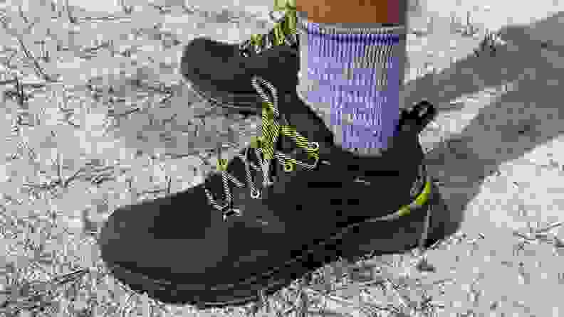 man in blue socks wearing Jack Wolfskin Force Striker shoe