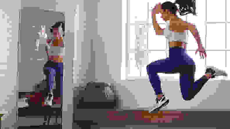 woman exercising in front of proform vue.