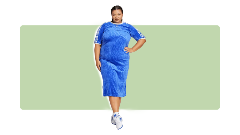 Plus size woman wearing adidas blue velour dress