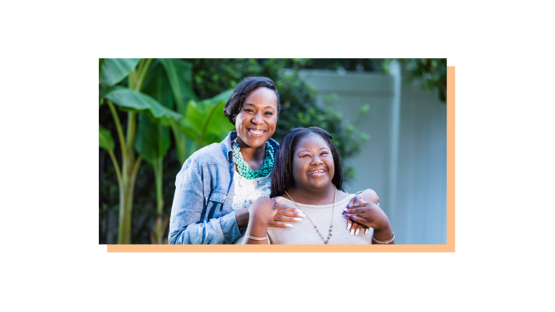 A woman with a special needs family member. They are both smiling.