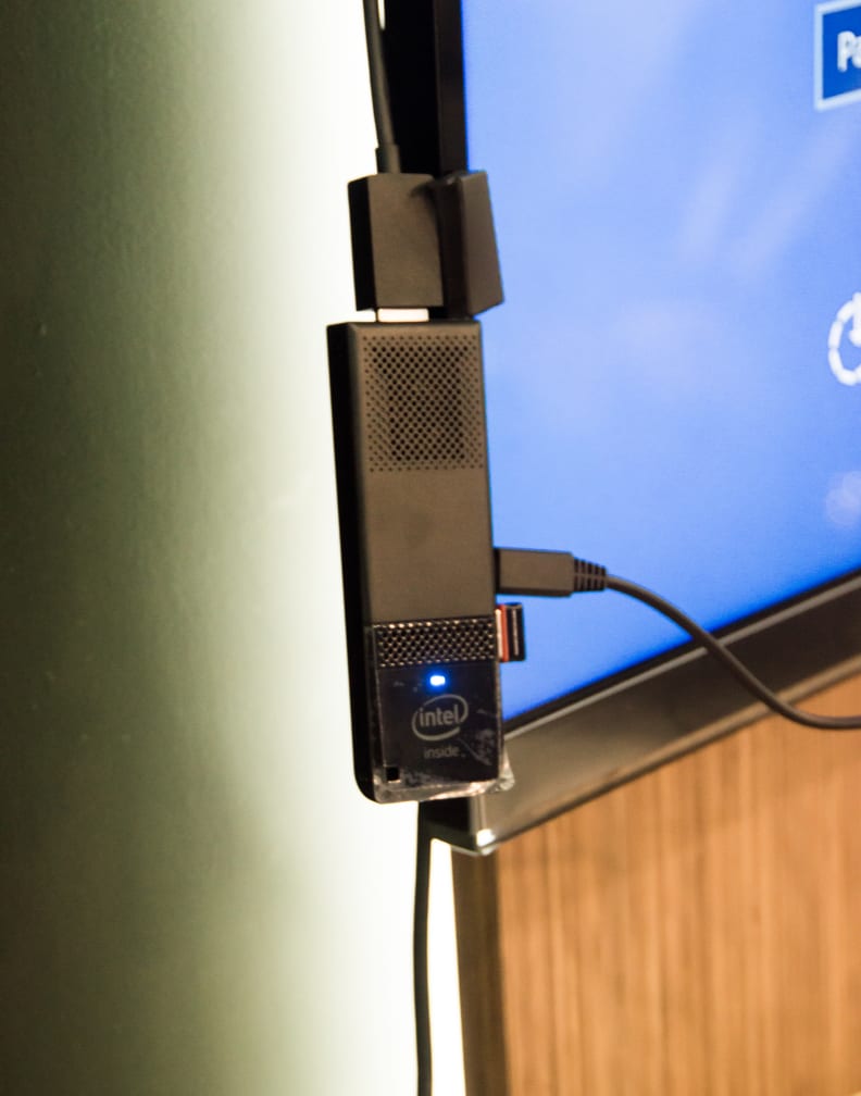 Power comes from a micro USB port. It may come from the HDMI in the future.