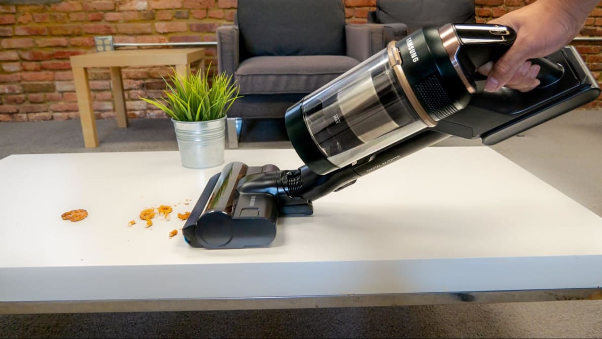 The Samsung Bespoke Jet cleaning up crumbs on a table