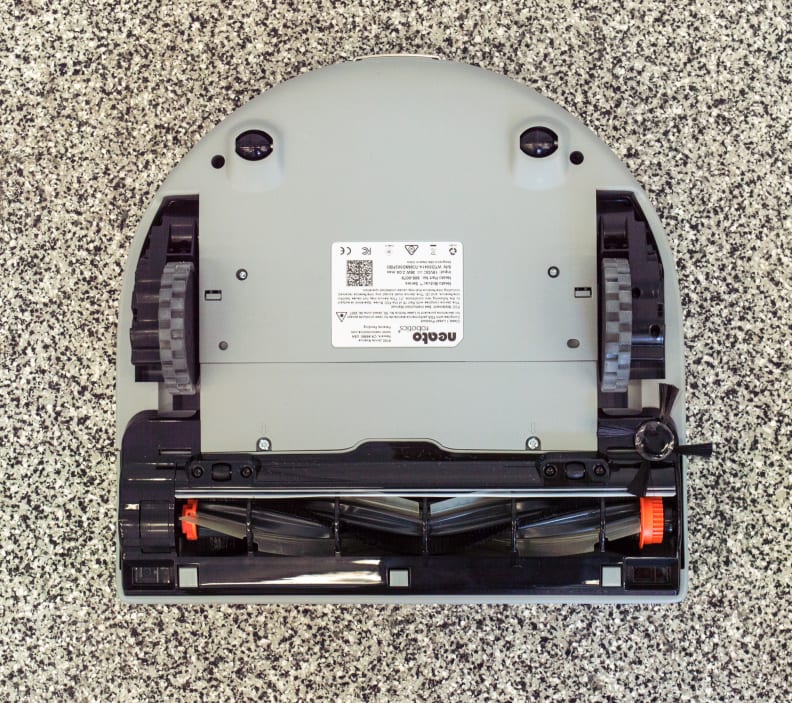 The Botvac's brush is located closer to its edge for better cleaning.