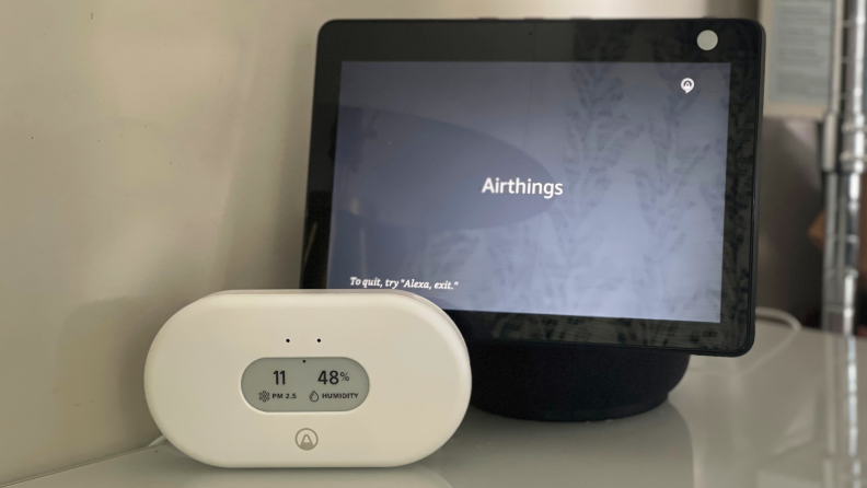 Airthings View Pollution sitting next to Amazon's Echo Show 10