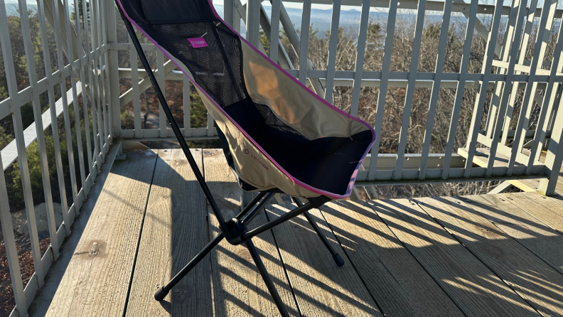 The chair with a view of the mountains in the back.