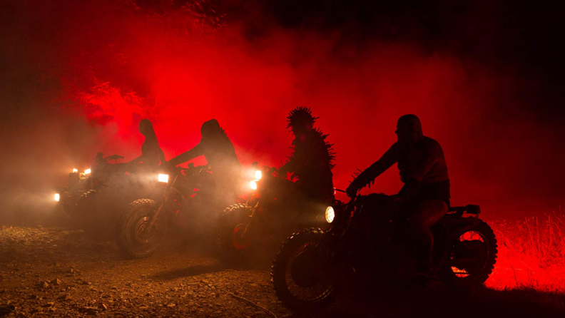 In a nighttime shot from the Nicolas Cage film Mandy, we see four devilish figures straddling motorcycles.