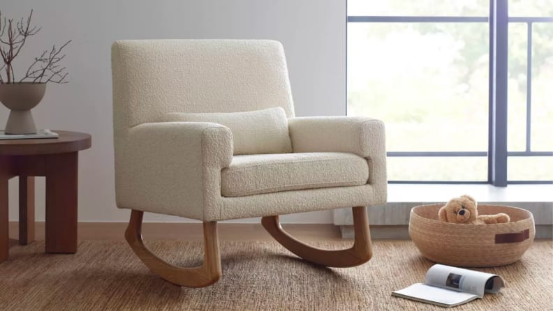 A rocking chair in a nursery.