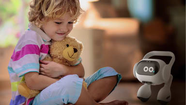 A child hugging a teddy bear next to the LG AI Agent