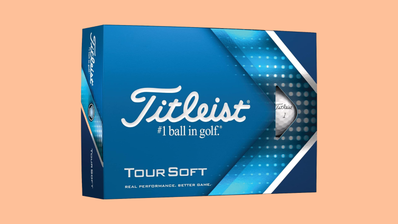 A blue box of a dozen Titleist golf balls on an orange background.