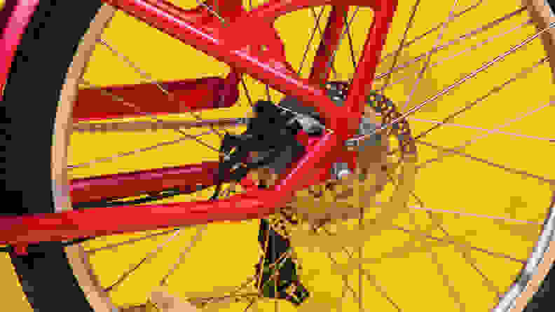 The rear wheel of the Radio Flyer Cruiser e-bike showing the hub motor and brake disc