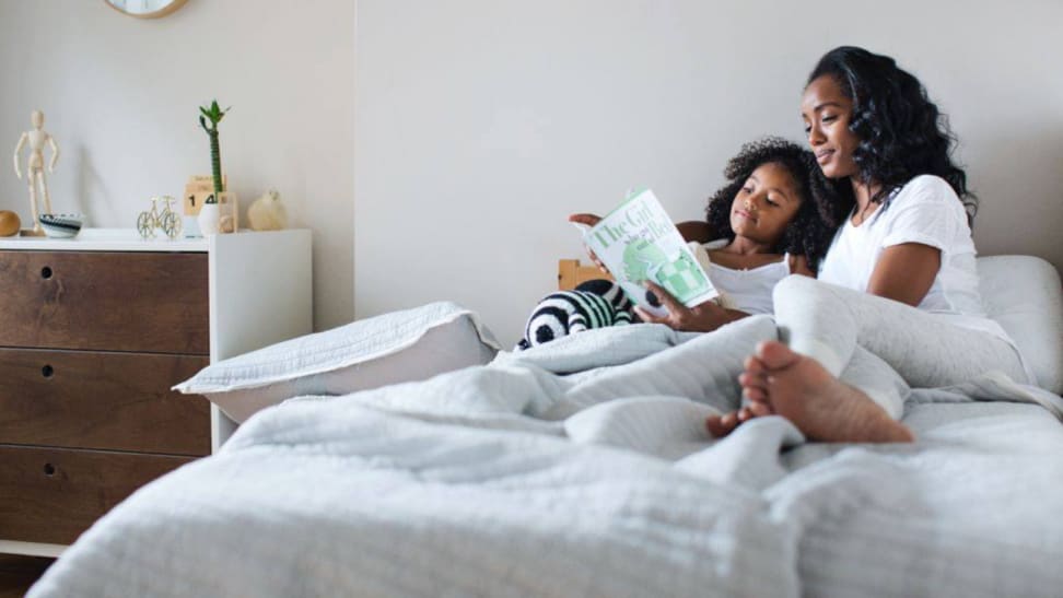 Mother and child on bed