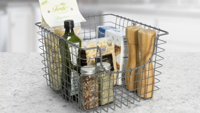 Wire basket holding kitchen items