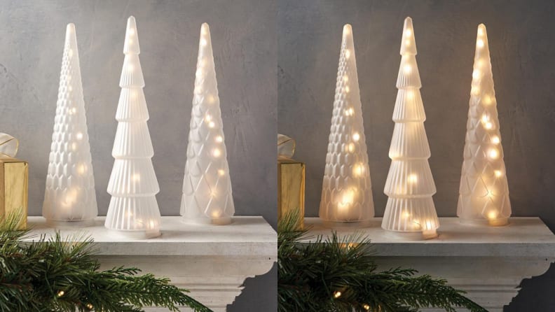 The frosted glass trees automatically light up for six hours at night.