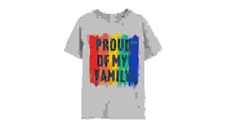 Grey tshirt on a white background with a rainbow on it and the words "Proud of my family" written on it in black lettering