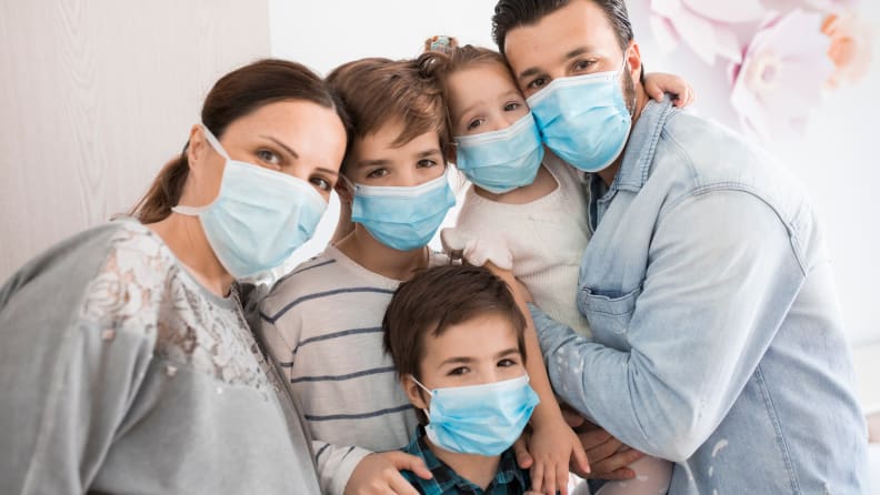 family wearing masks