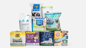 Nine packages of cat litter stacked in a pyramid