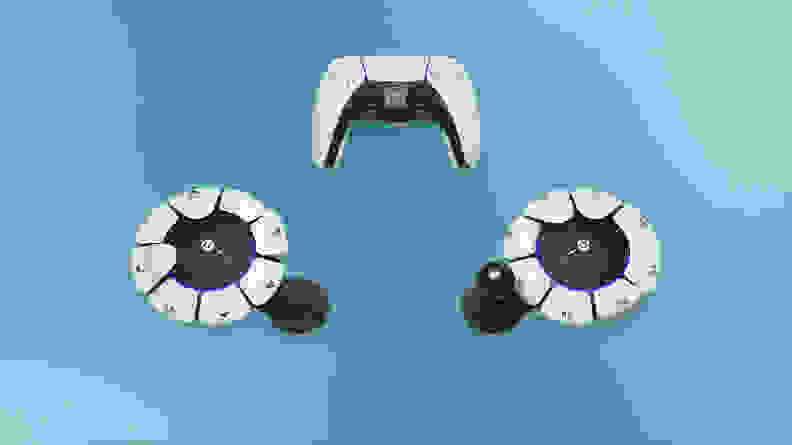 Three different sony playstation controllers, including two variants of an accessible controller.