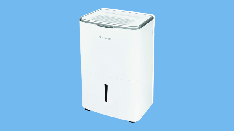 Image of the Frigidaire FGAC5044W dehumidifier against a light blue monochrome background